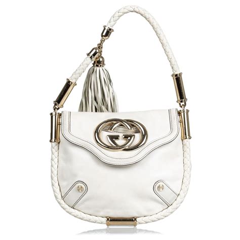 cream gucci handbag|gucci bag with tassel.